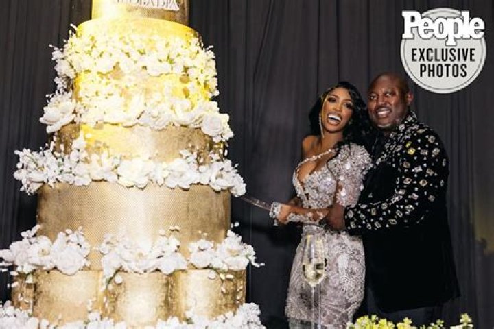 
Porsha Williams Needed a Sword to Cut into Her 10-Tier Wedding Cake with Husband Simon Guobadia 